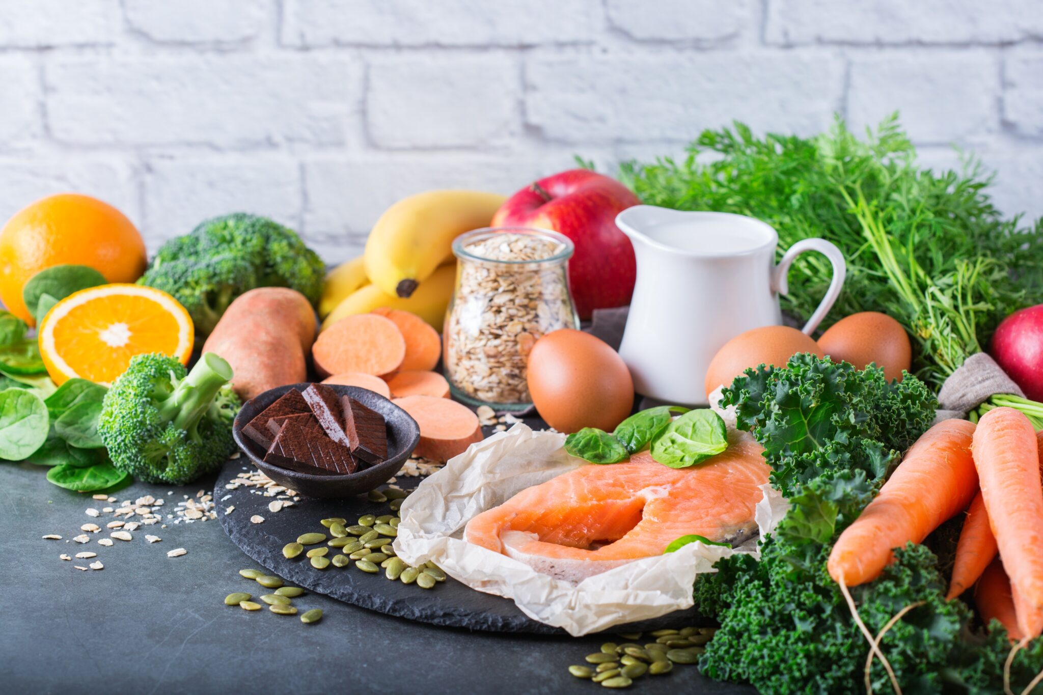 Balanced nutrition concept for DASH clean eating flexitarian mediterranean diet to stop hypertension and low blood pressure. Assortment of healthy food ingredients for cooking on a kitchen table.